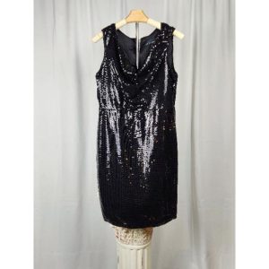 Black sequined cowl neckline sheath dress, with empire waistline.